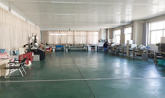 well-equipped testing and experiment center has Rotorless vulcanizer, universal tensile testing machine and impact testing machine